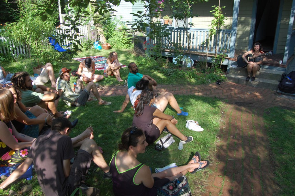 Kelly Dogtooth plays at 255 Chestnut Ave. during the 2015 Jamaica Plain Porchfest. (©Greg Cook photo)