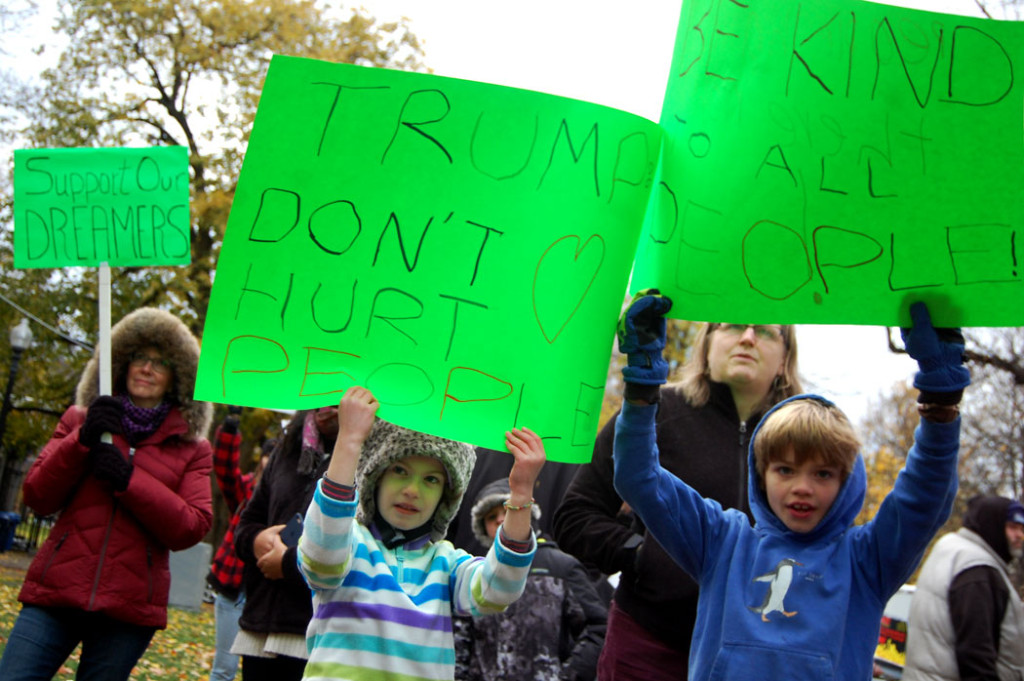 "Support our dreamers." "Trump don't hurt people." "Be kind to all people." At "Love Trumps Hate" rally at Boston Common, Nov. 20, 2016. (Greg Cook)