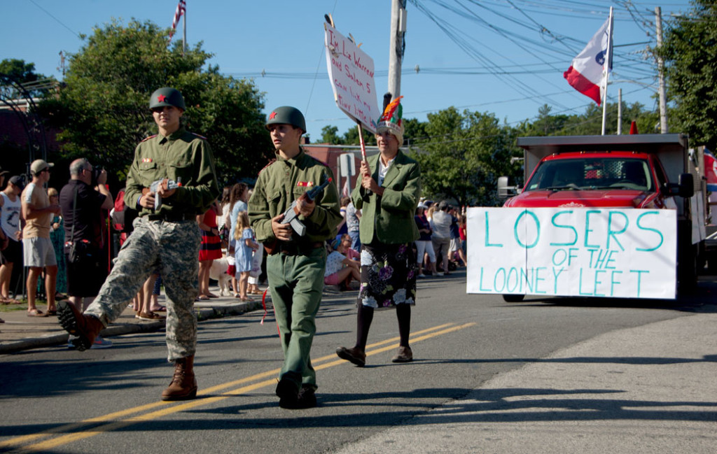 The 2017 Beverly Farms Horribles Parade: "Losers of the Looney Left" accompanied by a man dressed as "Elizabeth Warren" in a feathered headdress. (Greg Cook)