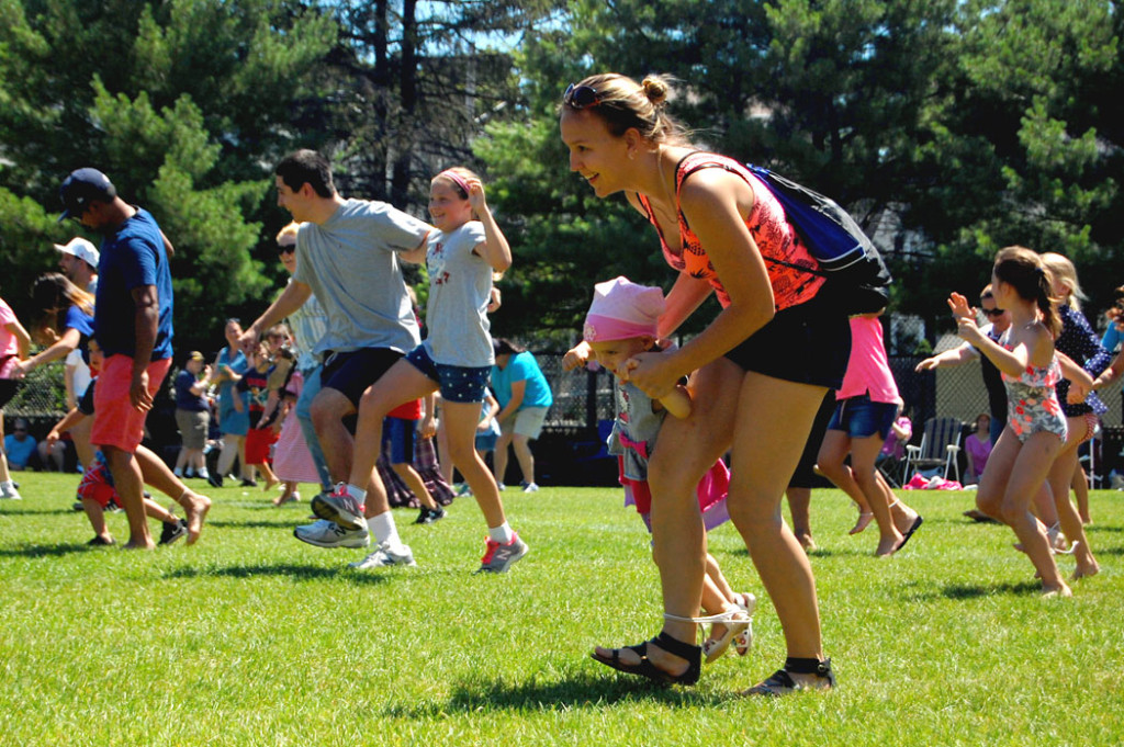 Three-legged race at Malden's Ward 5 Independence Day party. (Greg Cook)