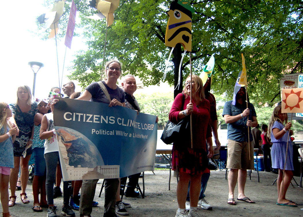 Amanda Babson of Citizens Climate Lobby Rhode Island in the Foo-topia parade. (Greg Cook)