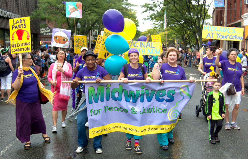 Midwives For Peace and Justice march in the Honk Parade, Sept. 8, 2017. (Greg Cook)