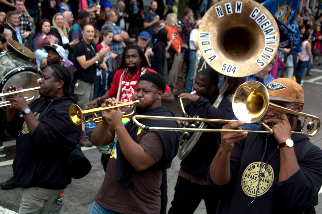 The New Creations Brass Band from New Orleans plays in the Honk Parade, Sept. 8, 2017. (Greg Cook)