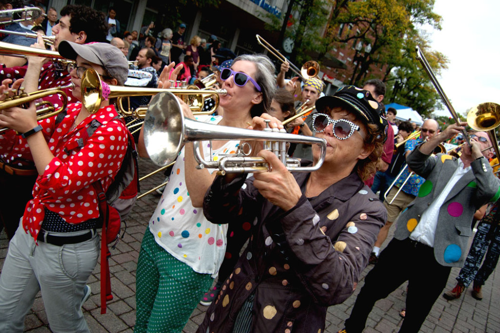 The School of Honk plays as the Honk Parade reaches Harvard Square, Cambridge, Oct. 8, 2017. (Greg Cook)