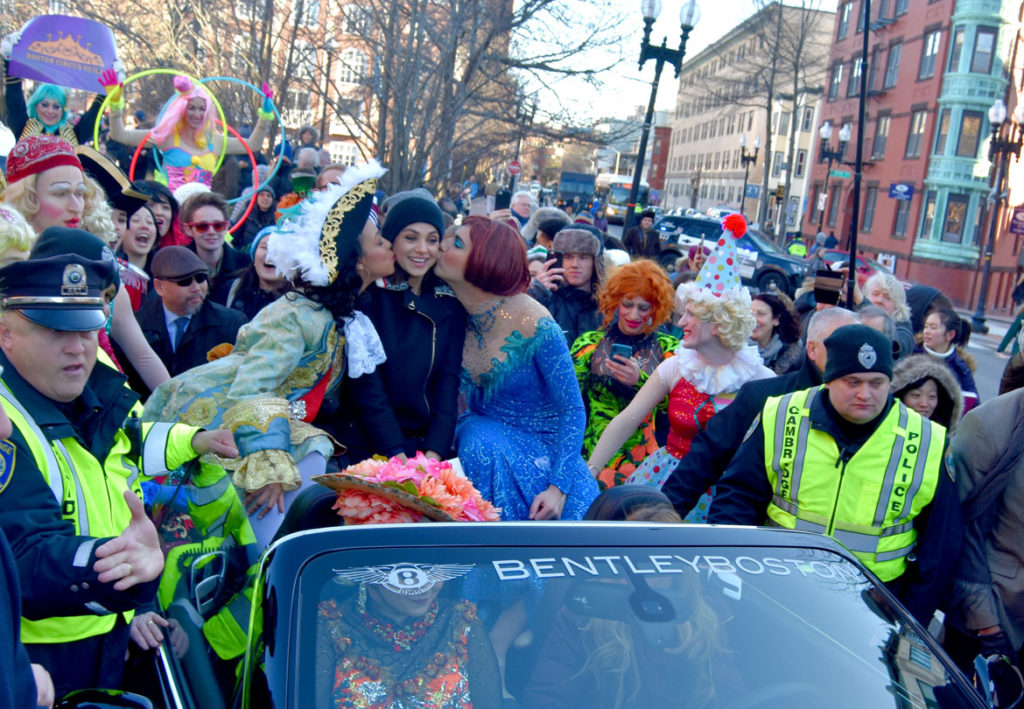 Hollywood actor Mila Kunis appears in Harvard’s Hasty Pudding’s Woman of the Year Parade down Massachusetts Avenue in Cambridge, Jan. 25, 2018. (Greg Cook)