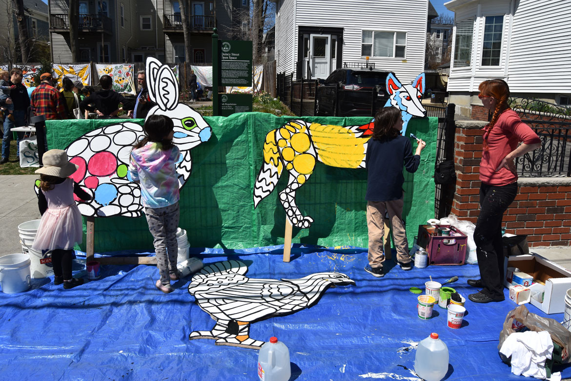 Painting mosaic-style animals designed by muralist Liz LaManche (right) at the Starting Over Festival, Somerville, April 22, 2018. (Greg Cook)