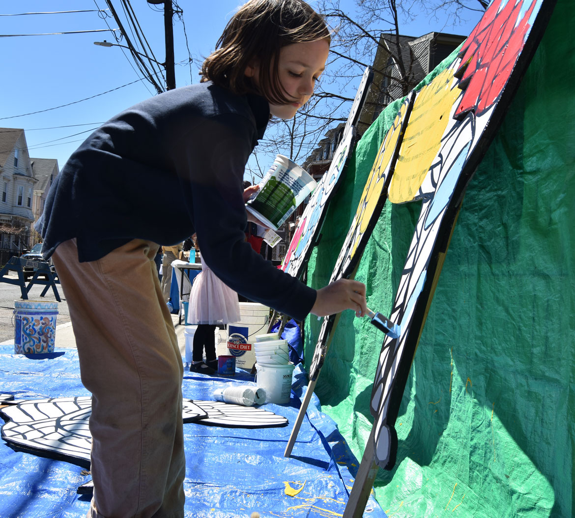 Painting mosaic-style animals designed by muralist Liz LaManche at the Starting Over Festival, Somerville, April 22, 2018. (Greg Cook)