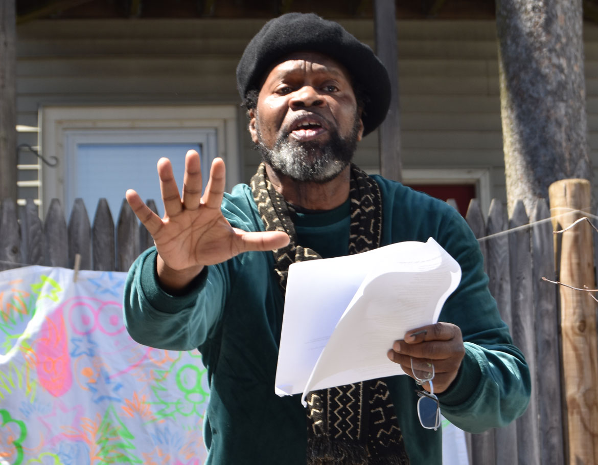 Eddy Toussaint Tontongi, a Haitian immigrant, read his poem responding to Donald Trump’s insults of his homeland at the Starting Over Festival, Somerville, April 22, 2018. (Greg Cook)