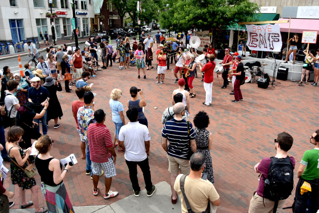 Second Line Social Aid & Pleasure Society Brass Band plays at the "Save EMF" rally in Harvard Square, Cambridge, June 16, 2018. (Greg Cook)