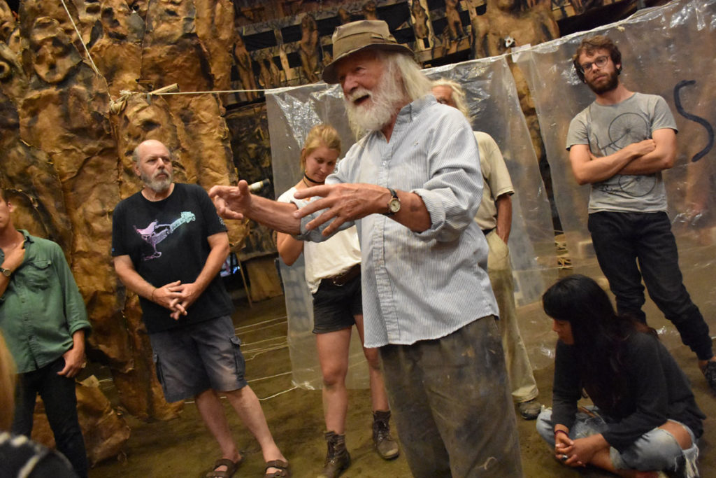 Peter Schumann directs Bread and Puppet Theater during a rehearsal of "Or Else" in the troupe’s Paper Mache Cathedral in Glover, Vermont, Aug. 17, 2018. (Greg Cook)