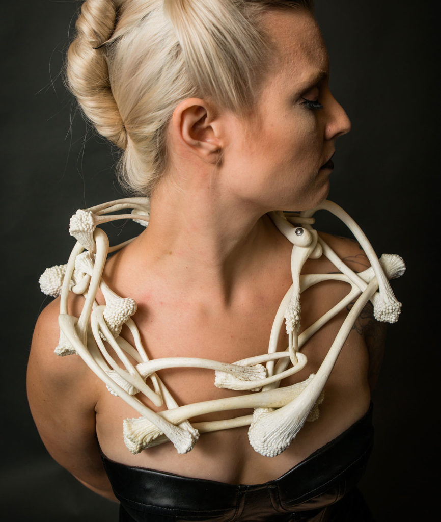 Caitlin Skelcey, "Ubiquitous Bone Chain," 2016, ABS plastic, stainless steel machine screws, 3D printing pen, implanted screws. (Courtesy Fuller Craft Museum)