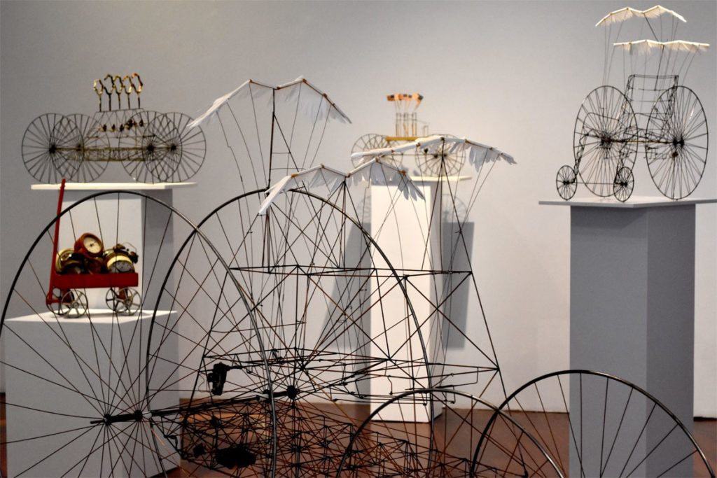 David A. Lang's 2007 sculpture "White Wings" (center) and other pieces in "Flights of Fancy" at Boston Sculptors Gallery, Jan. 4, 2019. (Greg Cook)