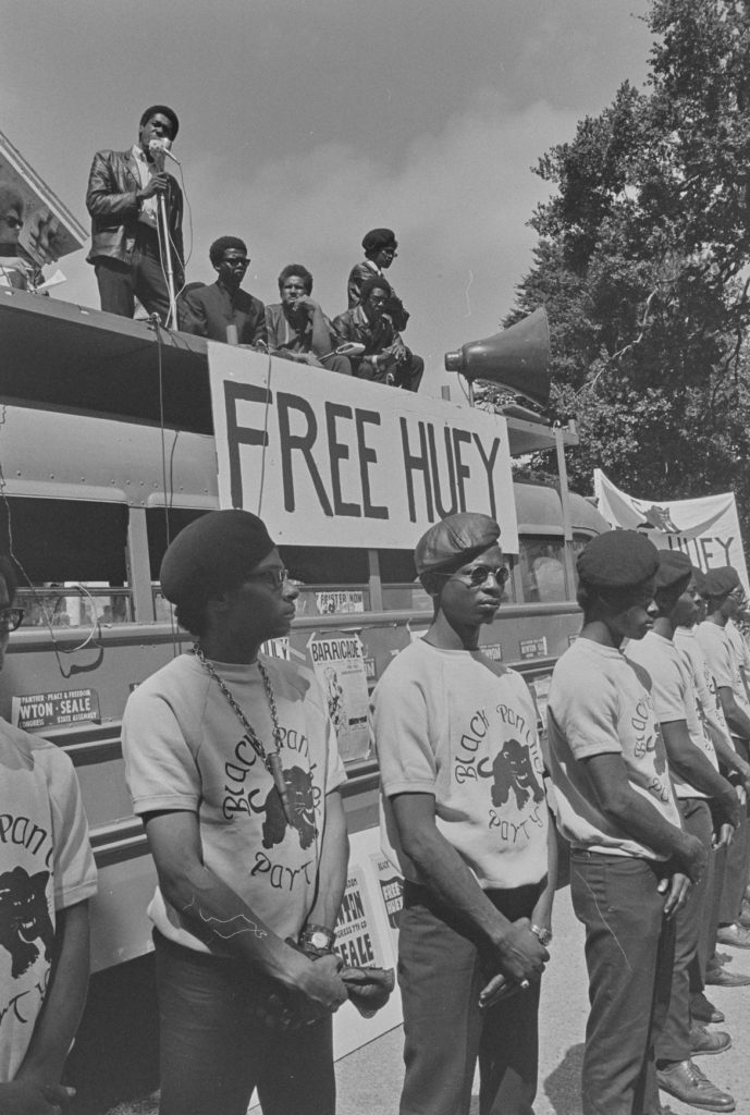 Pirkle Jones, "Bobby Seale speaking on Free Huey Rally Bus, Free Huey Rally, De Fremery Park, Oakland, CA," July 14, 1968. (Courtesy University of California, Santa Cruz)