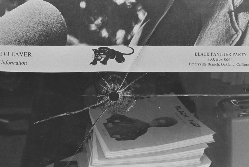 Pirkle Jones, "Black Panther Party national Headquarters window, shattered by the bullets of two Oakland, California policemen," Sept. 10, 1968. (Courtesy University of California, Santa Cruz)