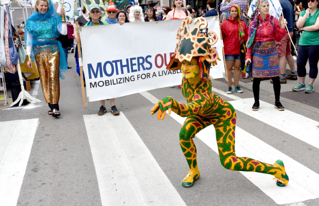 Fine Art Superheroes followed by Mothers Out Front in the Mermaid Promenade at Cambridge Arts River Festival in Central Square, June 1, 2019. (Greg Cook)