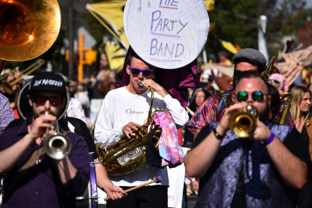 The Party Band from Lowell, Massachusetts, marches in the Honk Parade, Oct. 13, 2019. (Greg Cook photo)
