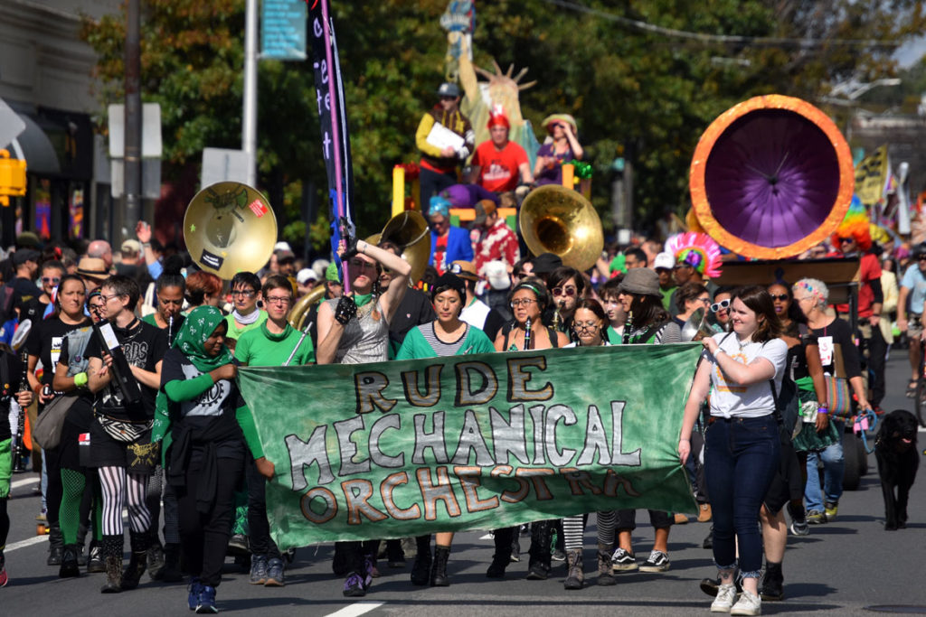 Rude Mechanical Orchestra from New York marches in the Honk Parade, Oct. 13, 2019. (Greg Cook photo)