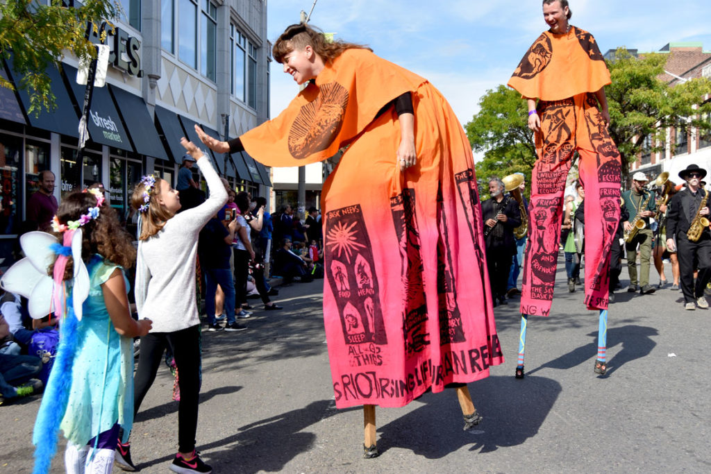 Bread and Puppet Theater stilters in the Honk Parade, Oct. 13, 2019. (Greg Cook photo)