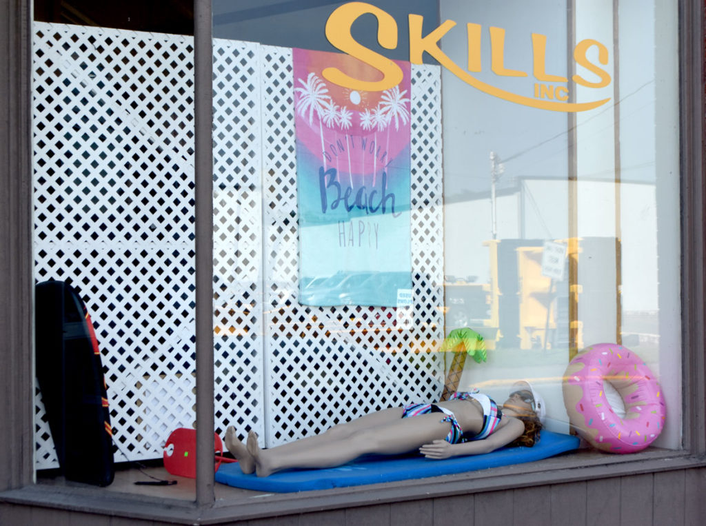 Skills store window, Skowhegan, Maine, July 30, 2019. (Greg Cook photo)