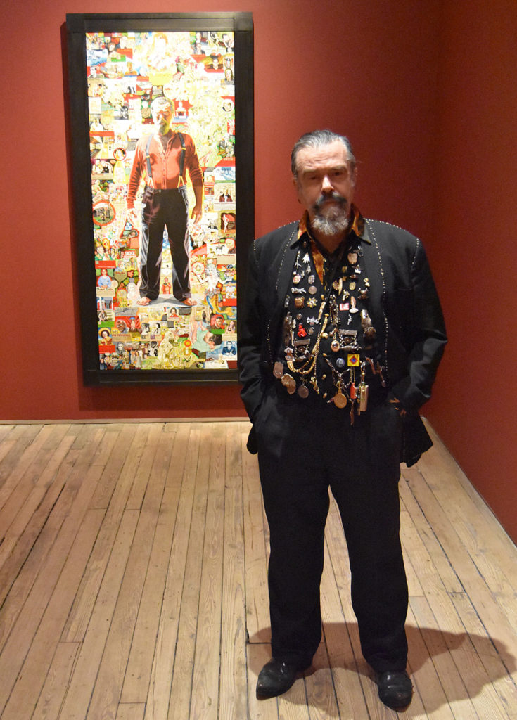Joe Coleman with his 2010 painting "A Doorway to Joe" at Andrew Edlin Gallery, New York, Dec. 6, 2019. (Greg Cook photo)