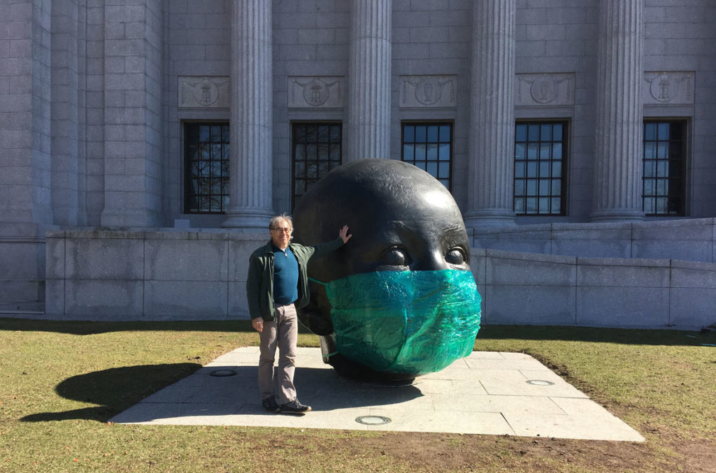 Peter Agoos with his guerrilla art installation “PPE for Antonio López Garcia's ‘DAY’” at Boston's Museum of Fine Arts, March 22, 2020. (Courtesy Peter Agoos)