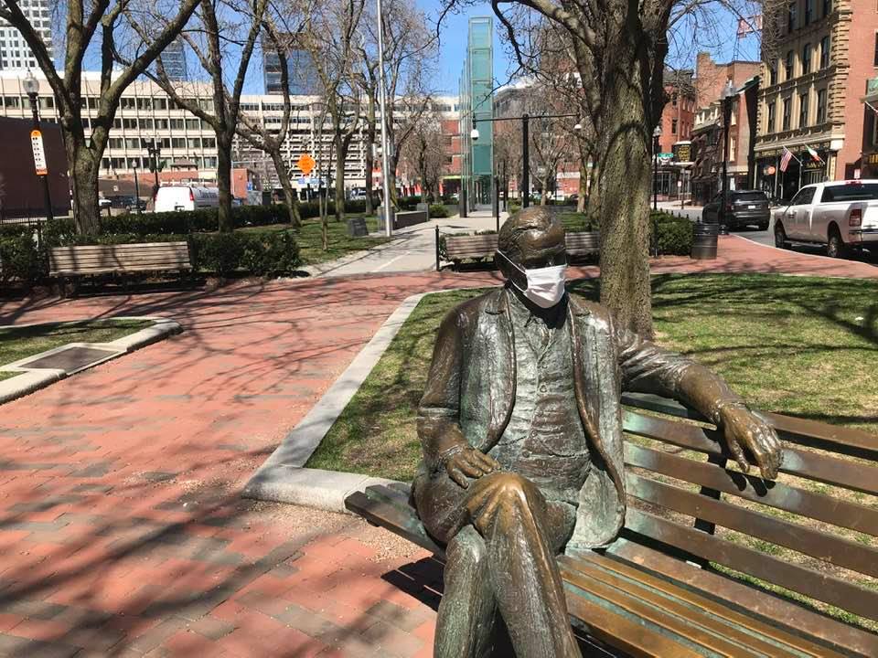 A protective mask has appeared on the statue of former Boston mayor James Michael Curley at Congress Street (by Lloyd Lillie, 1979–1980), c. April 6, 2020. (Courtesy)