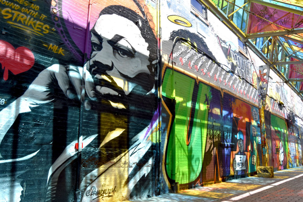 "Unified" mural at Graffiti Alley, Central Square, Cambridge, June 18, 2020. (© Greg Cook photo)