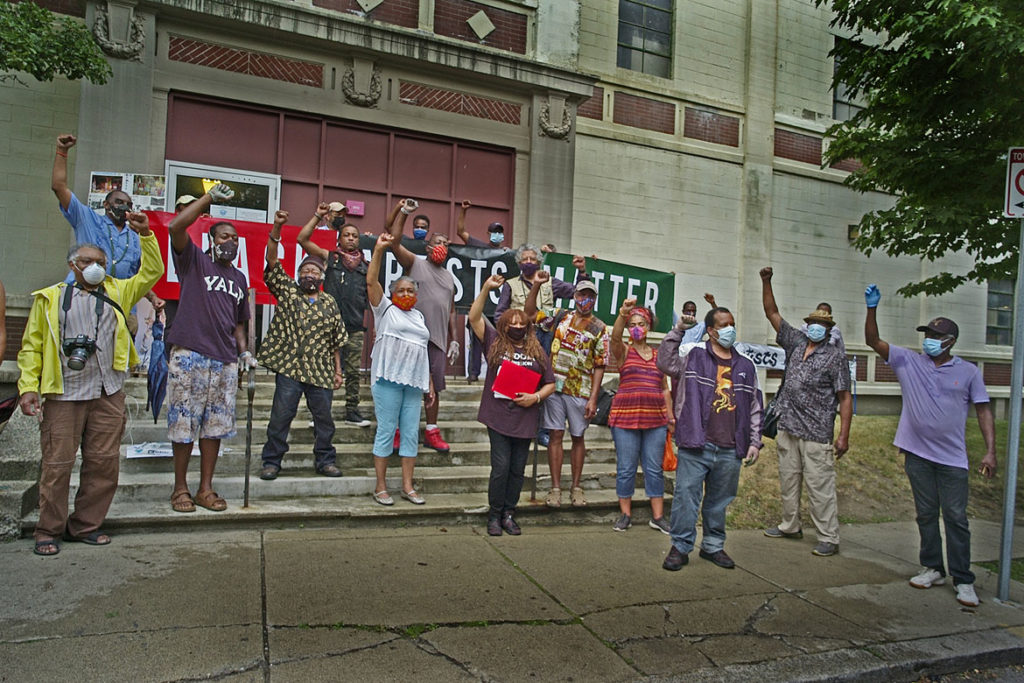 Artists and supporters of the African American Master Artists In Residence Program protest outside the studios building at 76 Atherton St. in Boston's Jamaica Plain neighborhood, June 27, 2020. (Photo © copyright Don West / fOTOGRAfIKS)
