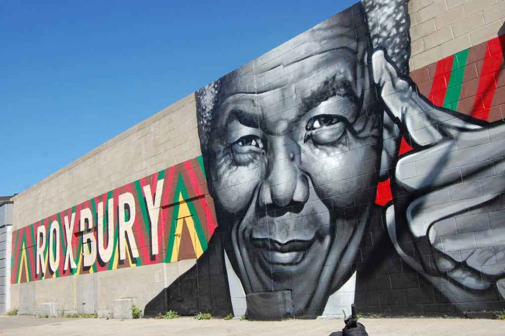 “Roxbury Love” (Mandela) mural painted in 2014 by Richard “Deme5” Gomez and Thomas “Kwest” Burns at Warren Street at Clifford Street in Boston, Oct. 7, 2015. (© Greg Cook photo)