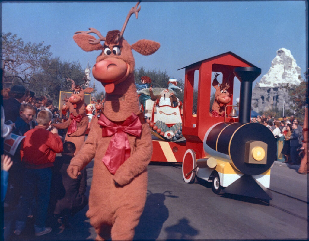 Christmas Parade at Disneyland, 1986. From "Holiday Magic at the Disney Parks: Celebrations Around the World from Fall to Winter" by Graham Allan, Rebecca Cline, and Charlie Price, 2020. (Disney Editions)