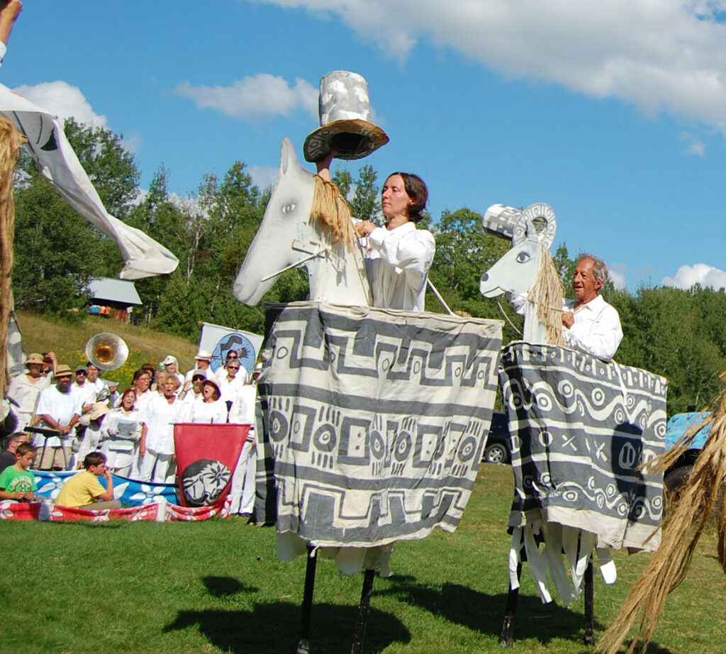 Remi Paillard (right) performs in the Bread and Puppet Circus, Glover, Vermont, Aug. 23, 2015. (©Greg Cook photo)