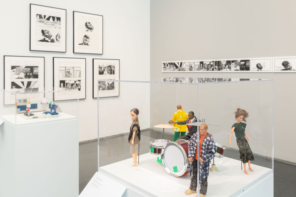 Kerry James Marshall “Rhythm Mastr" comics and doll models. In “Chicago Comics” at Chicago’s Museum of Contemporary Art, 2021. (Photo: Nathan Keay, © MCA Chicago)