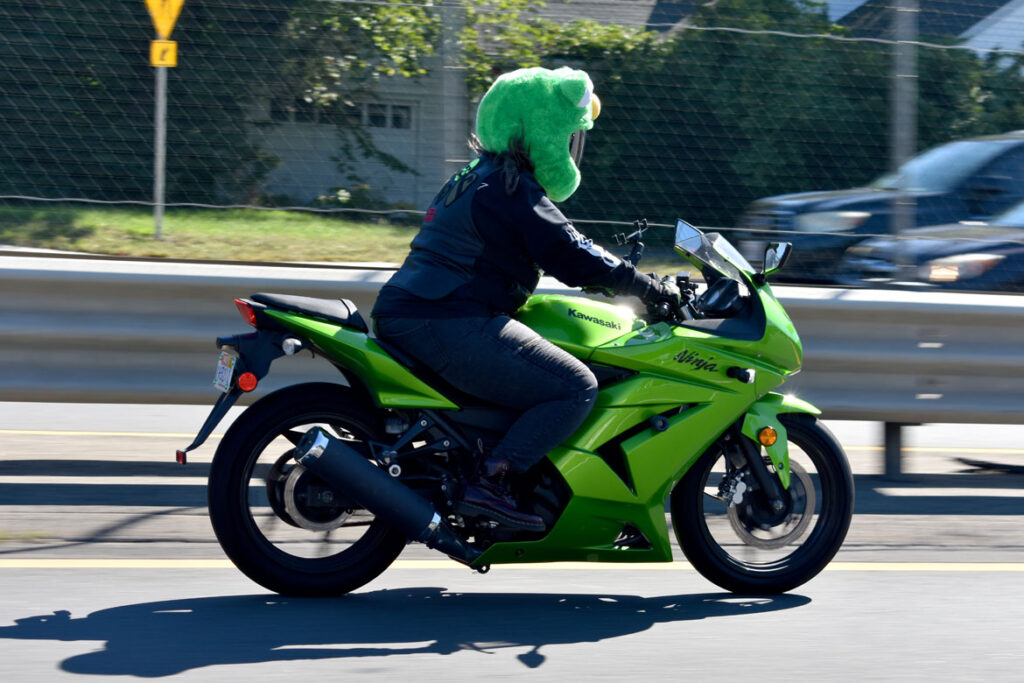 A Muppet motorcyclist rides with Cruiser Club Boston south along Route 1, through Saugus, Sept. 19, 2021. (©Greg Cook photo)