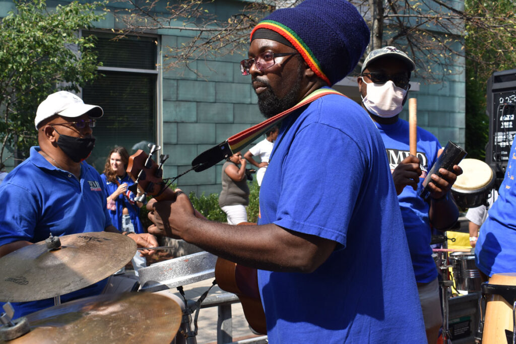 Tempo International Rhythm Section performs in the Cambridge Carnival parade, Sept. 12, 2021. (©Greg Cook photo)