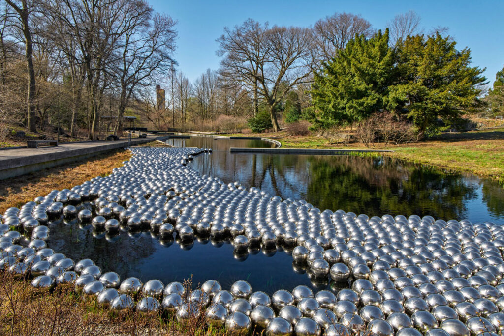 Yayoi Kusama, "Narcissus Garden," 1966/2021, at The New York Botanical Garden, 2021. 1,400 stainless steel spheres. (Courtesy of Ota Fine Arts, Victoria Miro, and David Zwirner. Photo by Robert Benson Photography.)