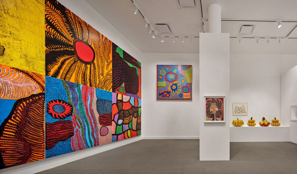 A variety of paintings on canvas by Yayoi Kusama exhibited in "Kusama: Cosmic Nature" at The New York Botanical Garden, 2021. (Photo by Robert Benson Photography)