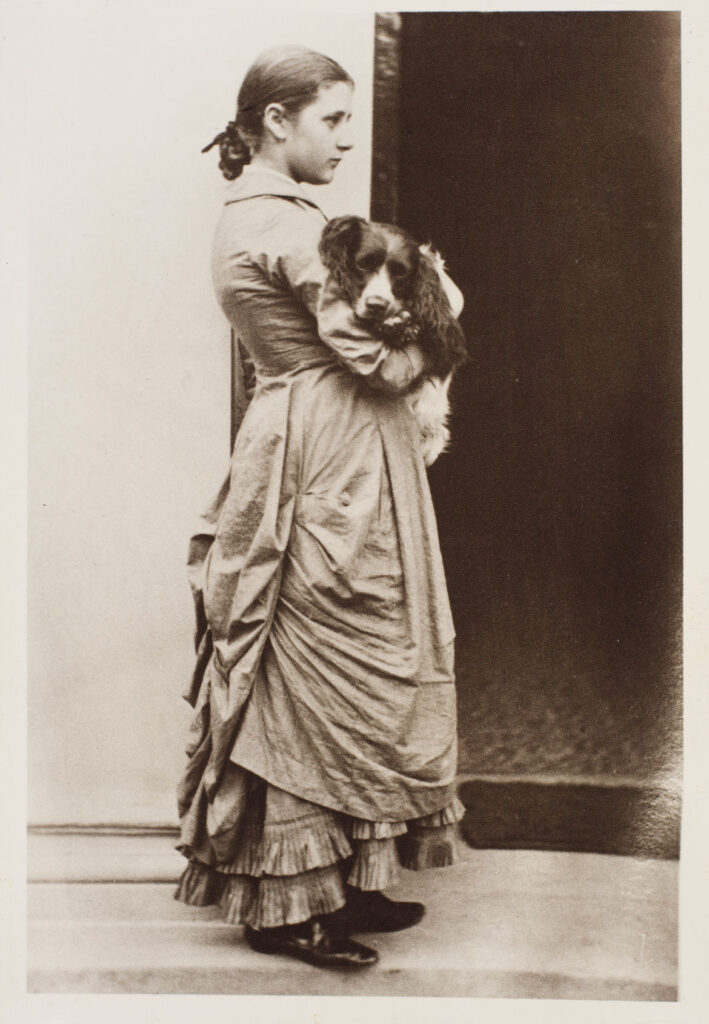 Beatrix Potter, aged 15, with her dog, Spot, by Rupert Potter, c.1880–1. print on paper. Linder Bequest. © Victoria and Albert Museum, London, courtesy Frederick Warne & Co Ltd.