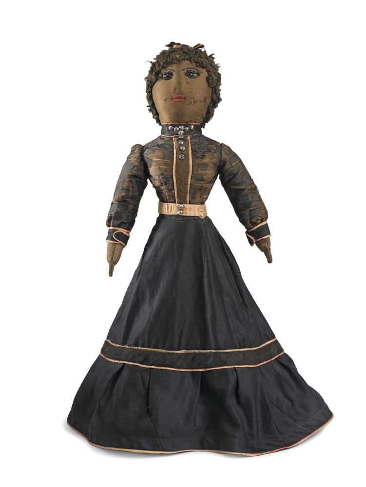 Doll in blue skirt, 1890-1900