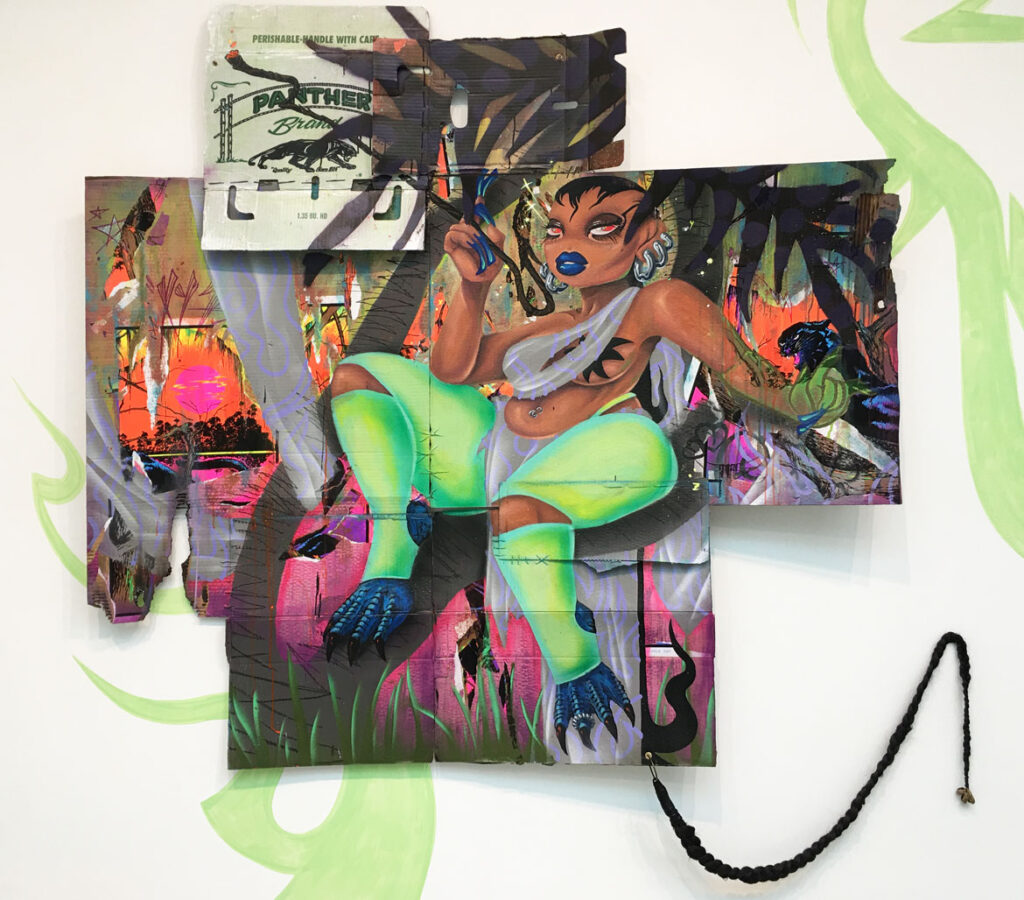 Rixy, “To Not Give a Mango’s Damn,” 2021, 69x69in, ultraviolet paper, spray paint, acrylic, ink, marker, pencil, thread + fire on treated cardboards, with synthetic hair tail, cowrie shells, + brass hardware.
