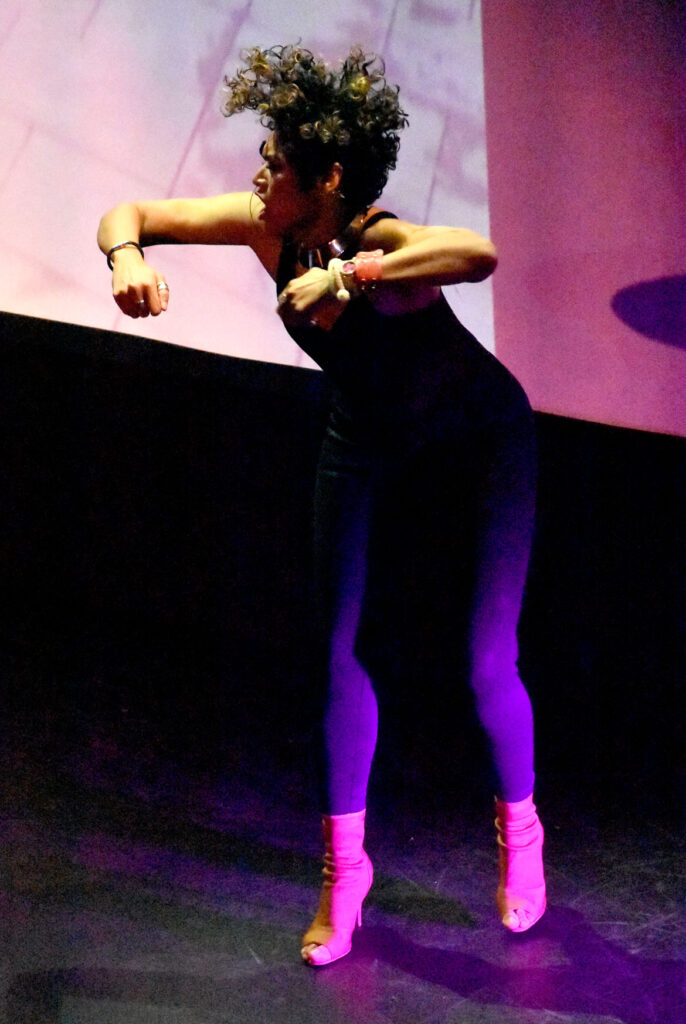 Ana Masacote dances at the Arts & Culture Summit from the Essex County Community Foundation's Creative County Initiative at The Cabot theater in Beverly, Sept. 30, 2022. (©Greg Cook photo)