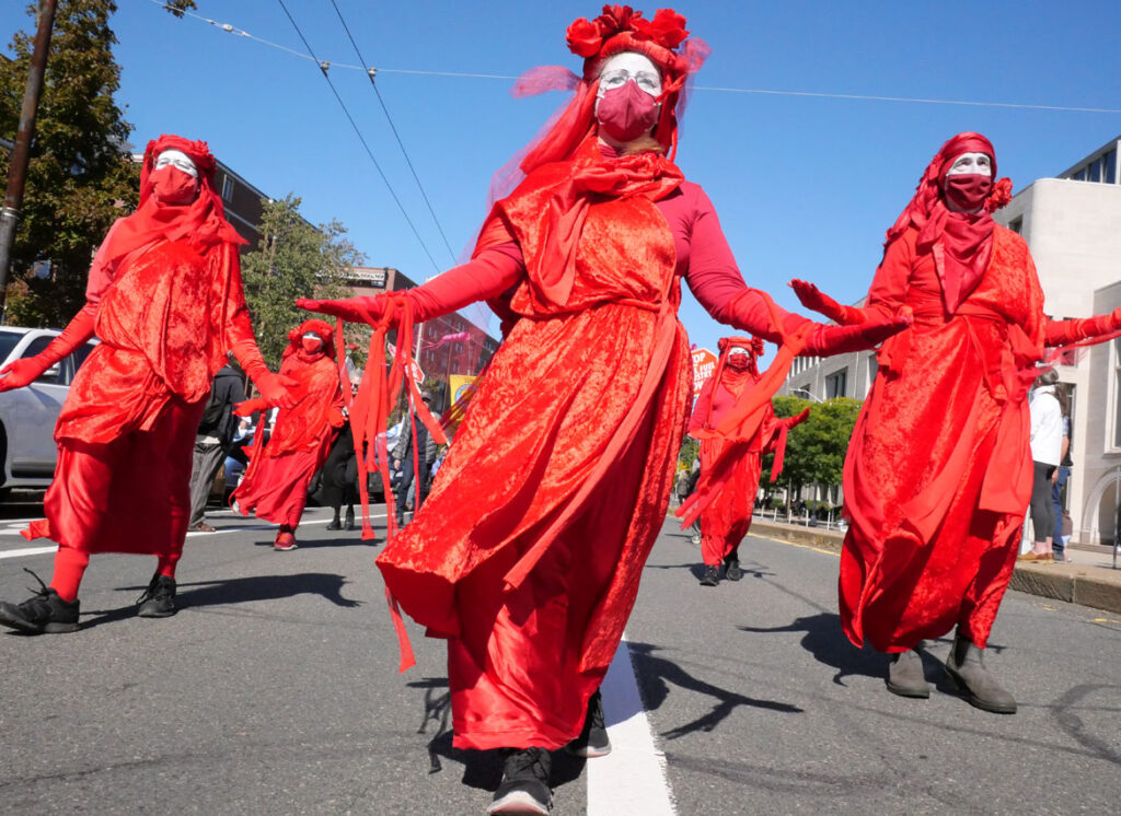 Extinction Rebellion marches in the Honk parade from Somerville's Davis Square to Cambridge's Harvard Square, Sunday, Oct 9, 2022 (©Greg Cook photo)