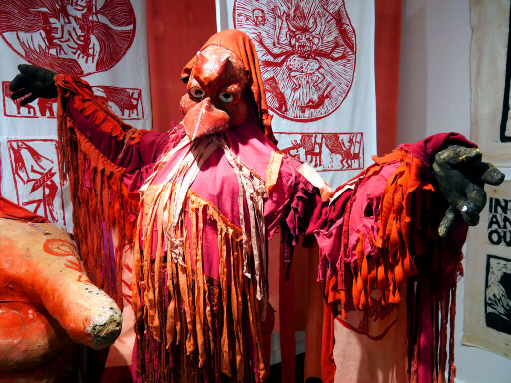Demon costume from the 1971 performance “The Birdcatcher in Hell” in the exhibition “Bread and Puppet Theater: Art and Activism in Five Acts” at Salem State University, November 2022. (©Greg Cook photo)