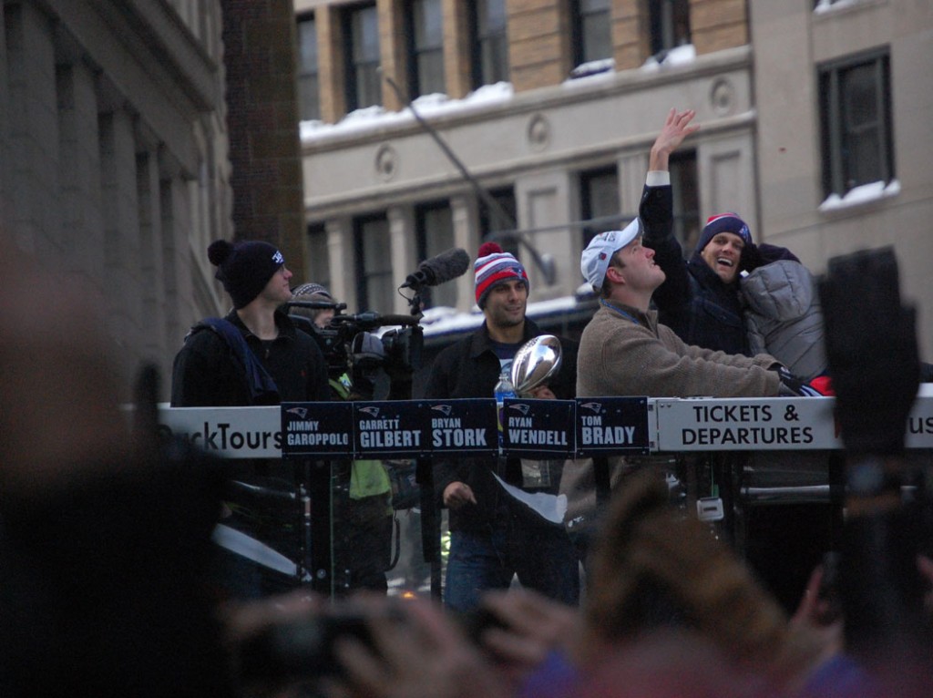 Tom Brady waves to the crowd at School Street. Jimmy Garoppolo holds trophy. (Greg Cook)