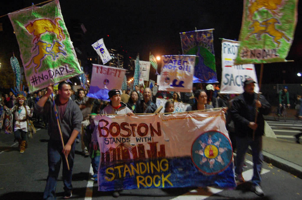 "Boston Stands with Standing Rock" march down Boston's Beacon Street.. (Greg Cook)