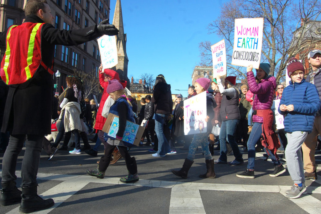 The "Boston Women's March" proceeds down Commonwealth Avenue, Jan. 21, 2017. (Greg Cook)