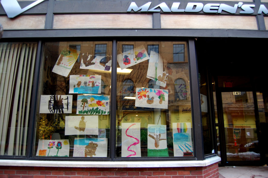 "Thank You, Nature Neighbors" art in the windows of Malden Access Television, March 28, 2017. (Greg Cook)