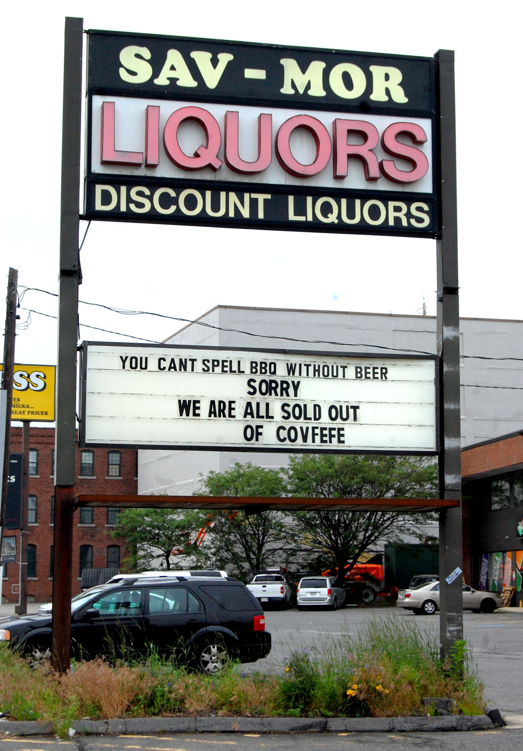 "We are all sold out of Covfefe" sign at Sav-Mor Liquors in Somerville, June 17, 2017. (Greg Cook)