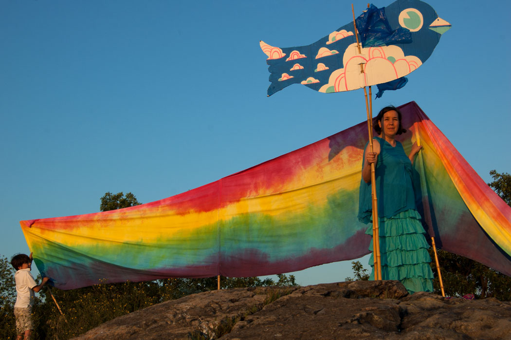 Bird puppet and rainbow banner by Kari Percival, Aug. 9, 2017. (Greg Cook)