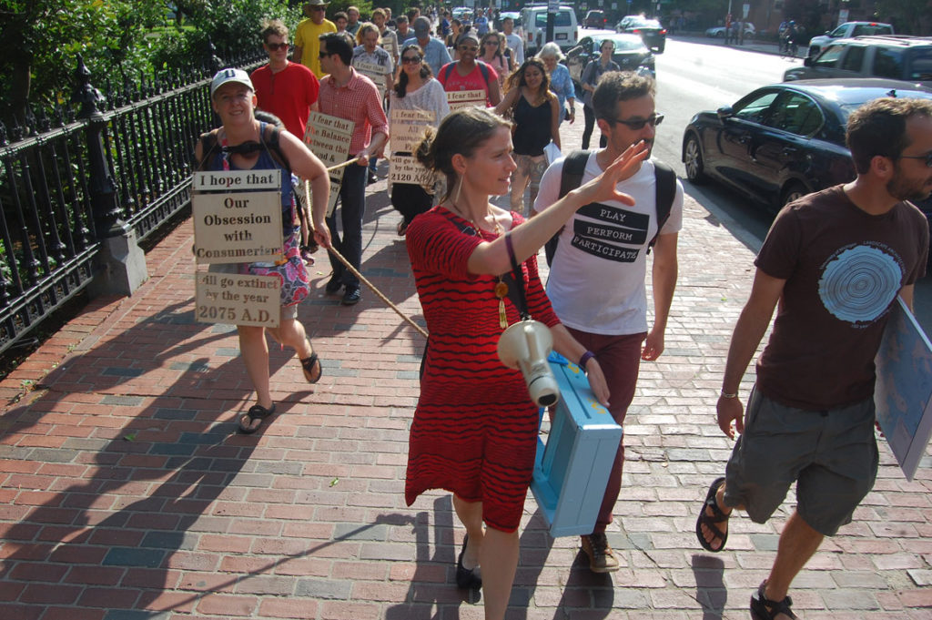 Catherine D'Ignazio leads the "performative walk" called "Boston Coastline: Future Past" that she and and Andi Sutton offered on June 19, 2015. (Greg Cook)