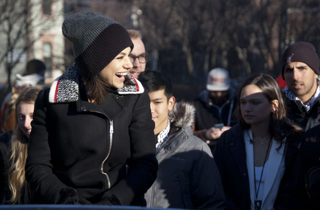 Hollywood actor Mila Kunis appears in Harvard’s Hasty Pudding’s Woman of the Year Parade down Massachusetts Avenue in Cambridge, Jan. 25, 2018. (Greg Cook)